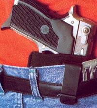 Скрытое ношение пистолета Smith & Wesson M 469 в «оперативной» кобуре за поясом