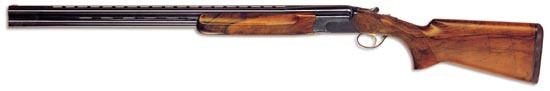 Ружьё МХ8 фирмы Perazzi. Модель специально предназначенная для спортинга. Ружьё оснащено селективным ударно-спусковым механизмом и сменными чоками. Быстросъёмный ударно-спусковой механизм ружья смонтирован на отдельном основании и при поломке может быть оперативно заменён на исправный