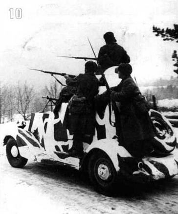 Бронеавтомобиль БА-20. Имеет деформирующий камуфляж из бело-зеленых пятен. Западный фронт, Можайское направление, район обороны 5-й армии. Декабрь 1941 г.