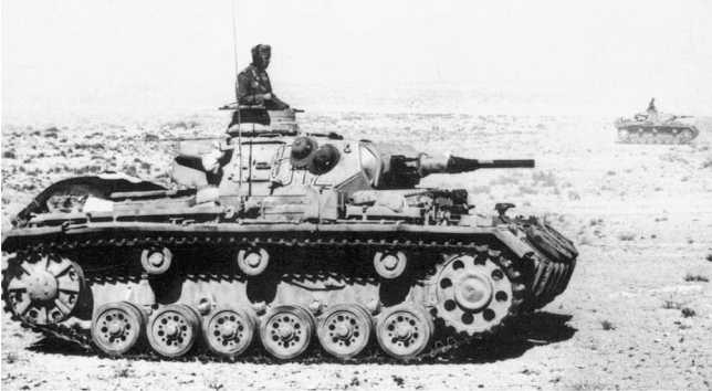 Pz.III Ausf.G из 6-й роты 5-го танкового полка в бою. Северная Африка, 1941 год.