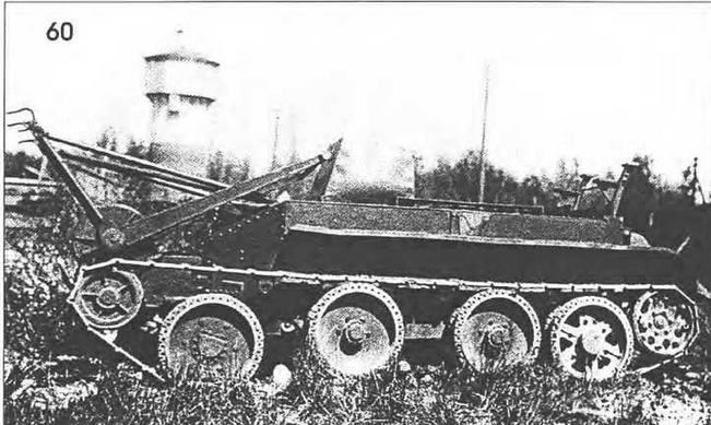 .Опытный образец саперного танка СБТ с установленным на корпусе железным колпаком.