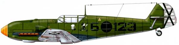 Bf 109Е-3 из 3.j/88, Испания, март 1939 г. Пилот Oberleutnant (старший лейтенант) Ганс Шмоллер-Хальди. Самолет несет на борту изображение Микки Мауса 3.J/88 и кружки пенного пива, личную эмблему пилота, члена клуба «Кардинал Пафф». Верхние поверхности: RLM 62. Нижние поверхности: RLM 65.