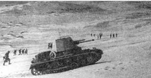 Panzerjager I поддерживает атаку немецкой пехоты в районе Эль-Газала (Киренаика). 1941 г.
