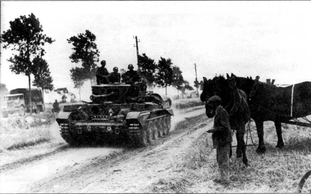 Танк Cromwell штабной роты 22-й танковой бригады движется в глубь французской территории. Нормандия, 1944 год