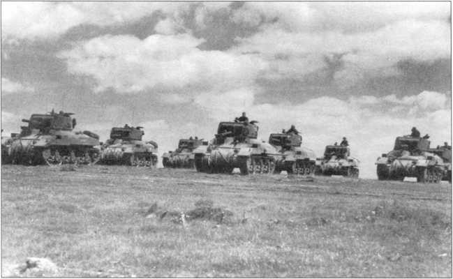 Ram II одной из канадских танковых частей во время учебных занятий в Англии. Лето 1942 года.