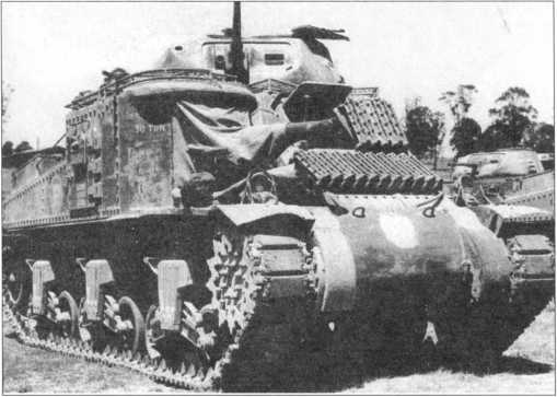 Модернизированный в Австралии средний танк МЗА5 Grant. Машина оборудована применявшейся только на Тихоокеанском театре военных действий специфической защитой от ручных гранат и шестовых мин.