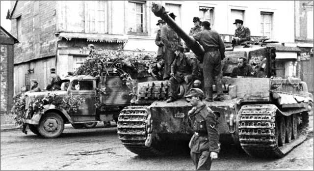 Один из «тигров» 3-й роты 503-го тяжелого танкового батальона во время боев в Нормандии. Июнь 1944 года.